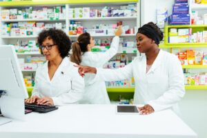 Two pharmacists report a near-miss event to the pharmacy's incident reporting platform.